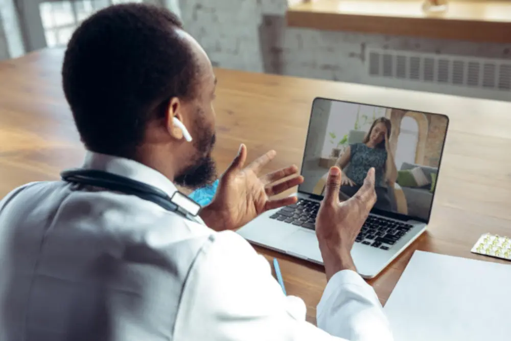 Private psychiatrist conducting online consultation