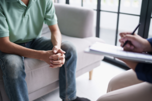 Man attending a private mental health therapy session with a professional clinician in Preston