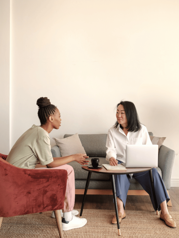 Therapist speaking with a woman during a counselling session
